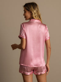 Vue de dos pyjama rayures soie rose col notch