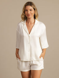Détail col revers soie blanche coupe oversize