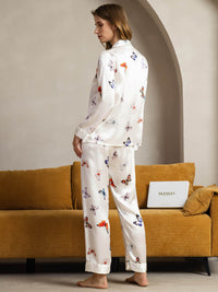 Vue de dos pyjama soie blanc imprimé papillon col revers